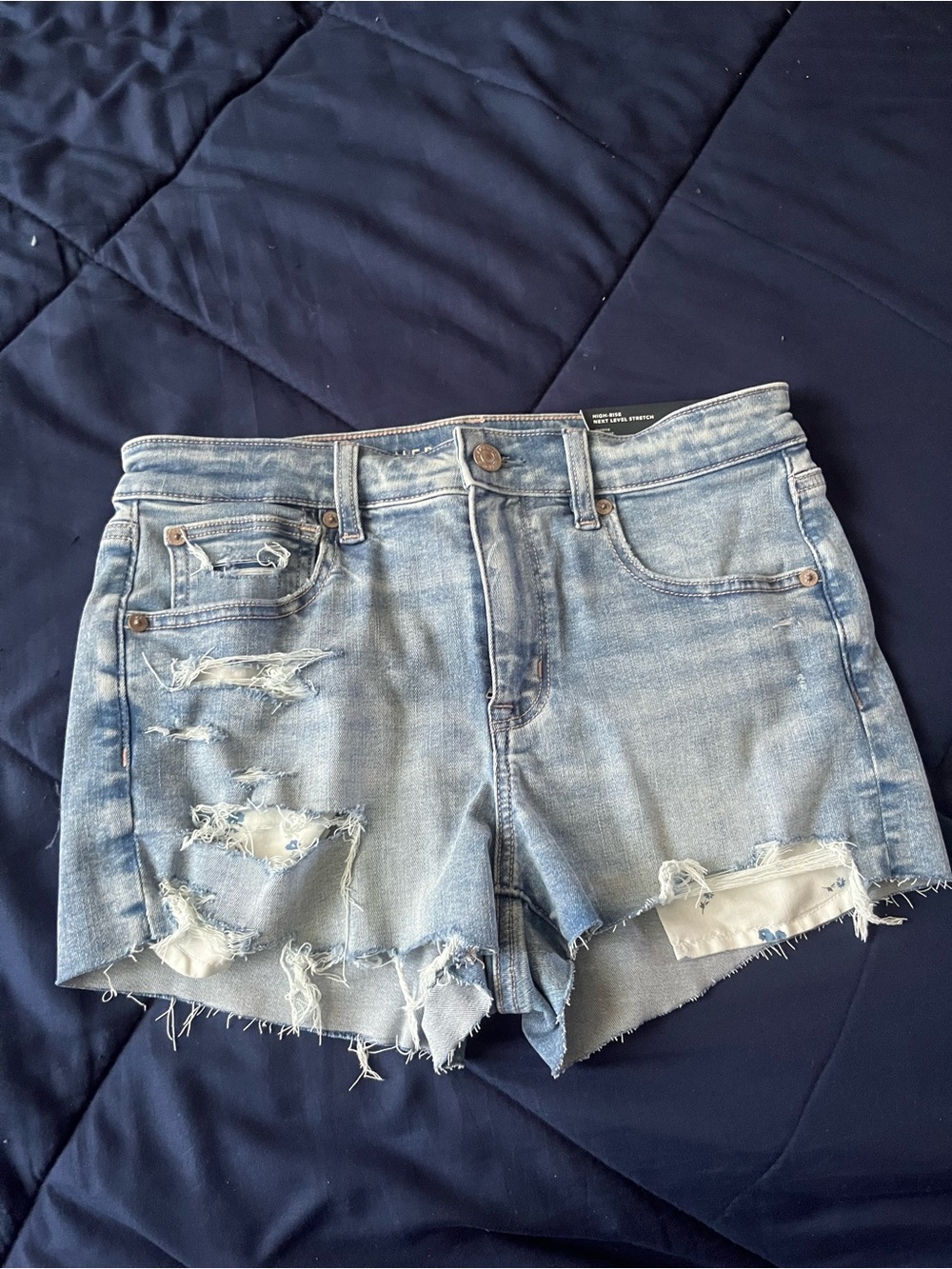 American Eagle Shortie High-Rise next level stretch distressed Denim Shorts